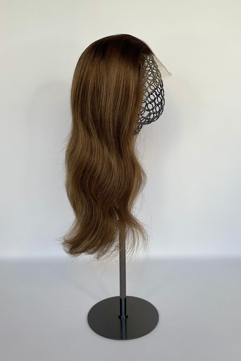 BHBD full or half lace wig in a rich chocolate brown shade with soft, natural waves. Made with 100% real Remy hair, offering a natural parting and lightweight comfort for versatile styling.