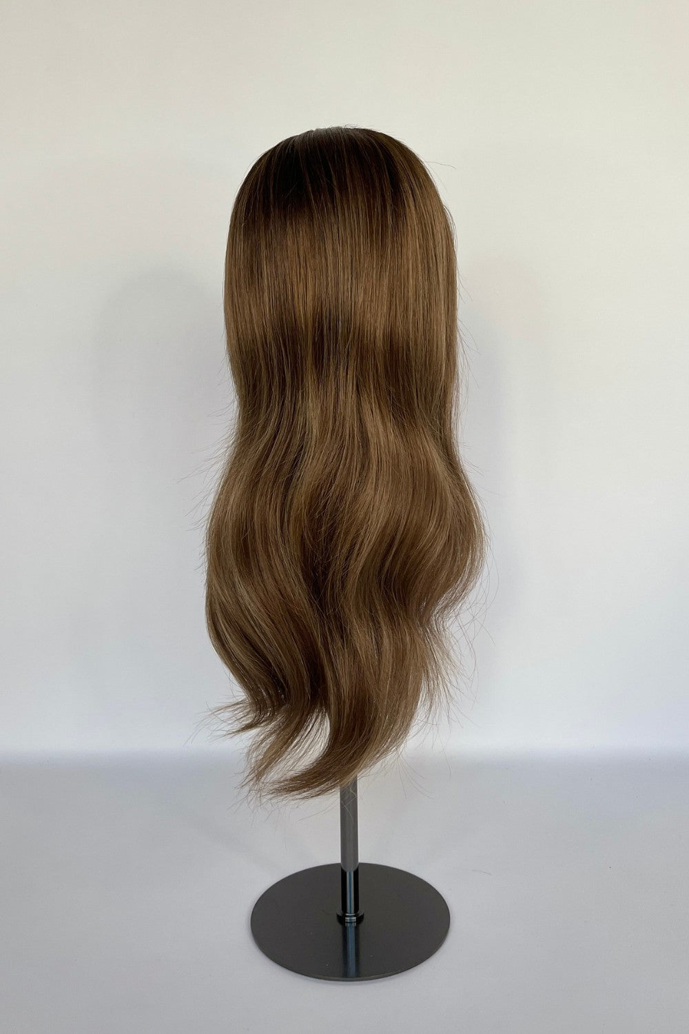 BHBD full or half lace wig in a rich chocolate brown shade with soft, natural waves. Made with 100% real Remy hair, offering a natural parting and lightweight comfort for versatile styling.