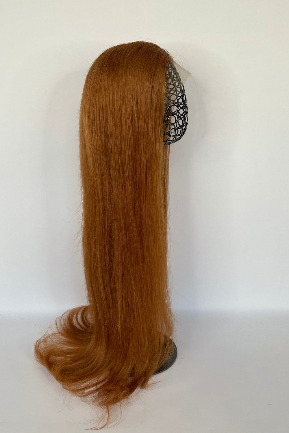 BHBD HD- lace wig in a vibrant copper red shade with sleek, straight, and long hair. Made with 100% real Remy hair, offering a natural parting and a flawless, bold look.